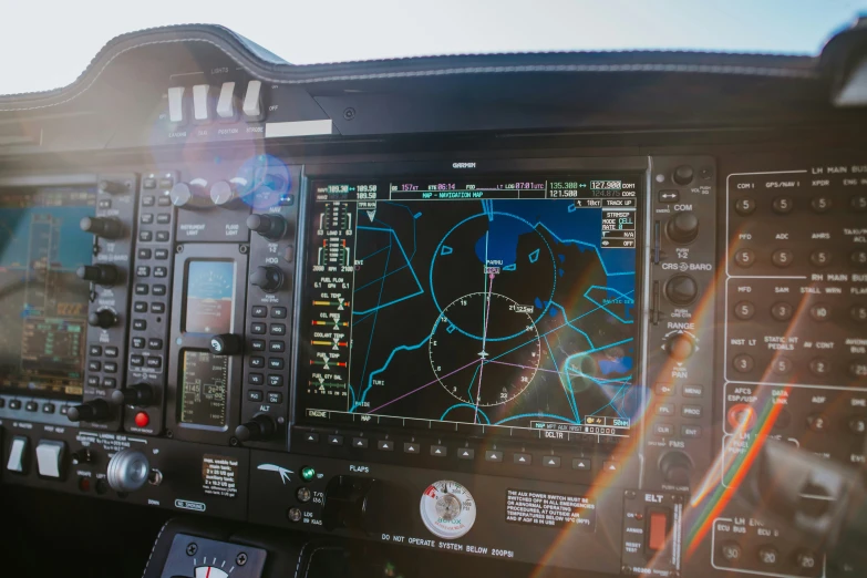 the cockpit area of an airplane, displaying multiple controls