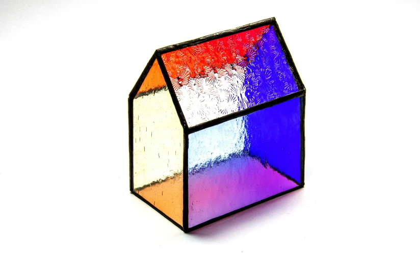 a small rubik puzzle is shown on a white background