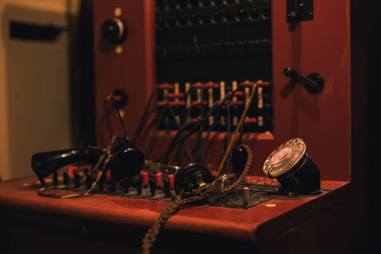 a row of old fashioned radio and an antique radio on a table