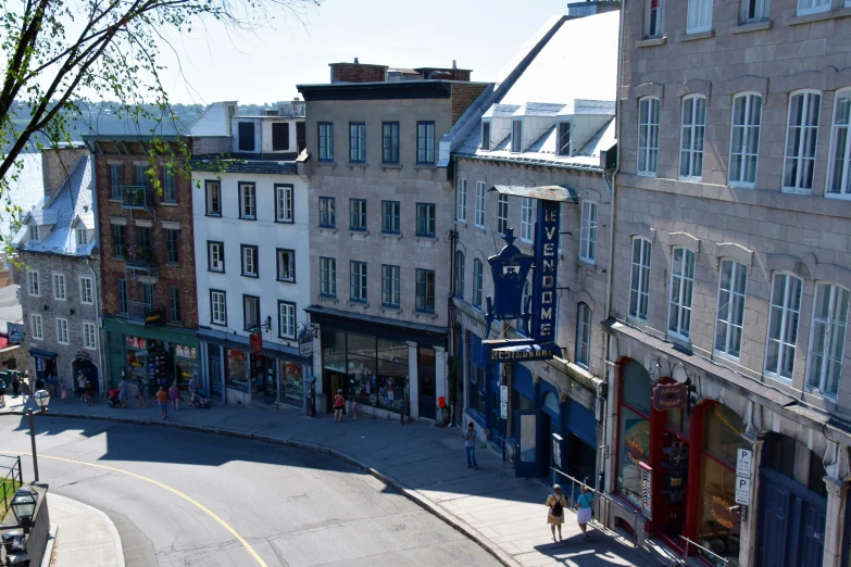 the city with many different buildings and shops