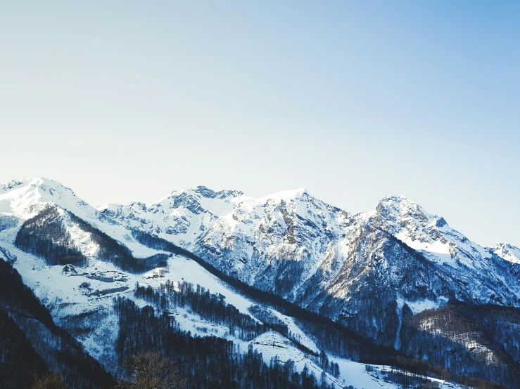 the top of a mountain covered in snow