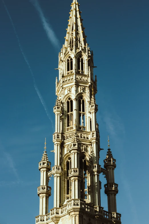 a very tall spire that has steeples on it