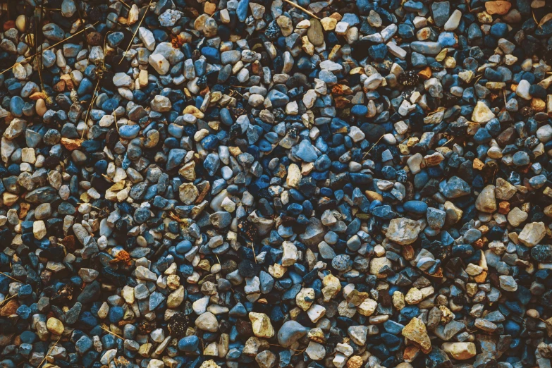 several small rocks and gravel on the ground