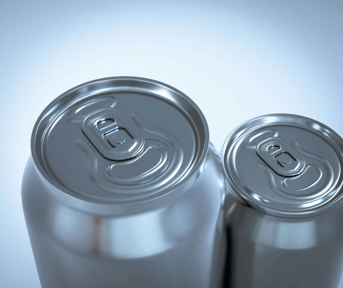 two cans of beer sitting side by side