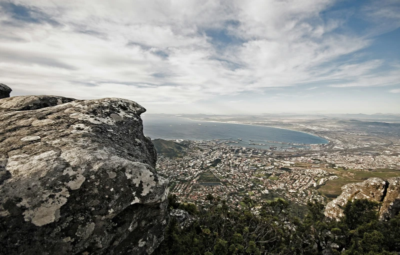 view of a city from a mountain top in the day