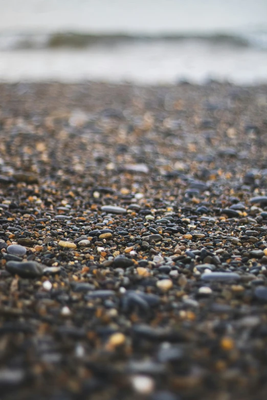 black and gold pebbles and gravel close up