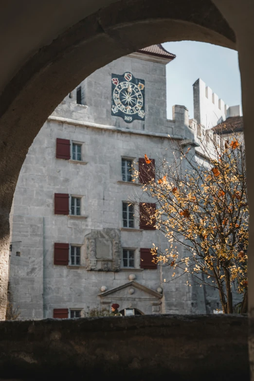 an arch that leads out into a building