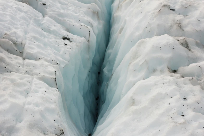 a  in the ground shows snow on it