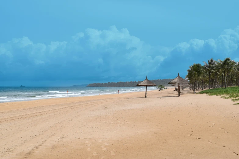 a white sandy beach on an ocean shoreline