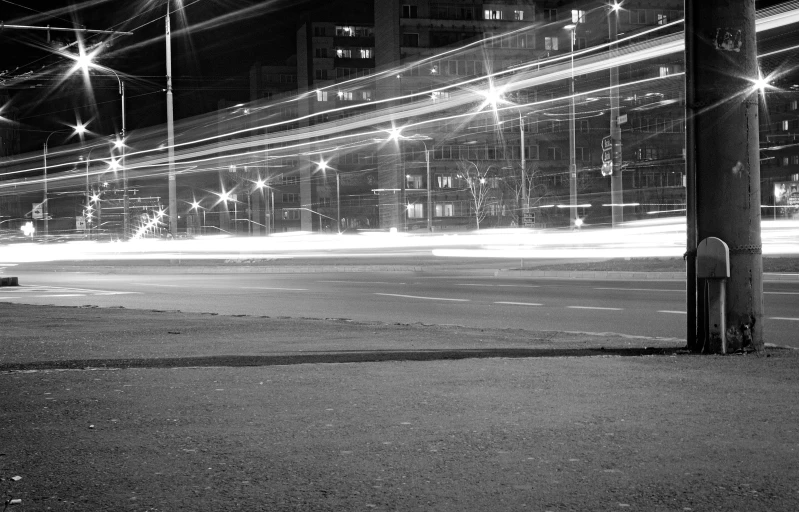 black and white po of an empty parking lot at night