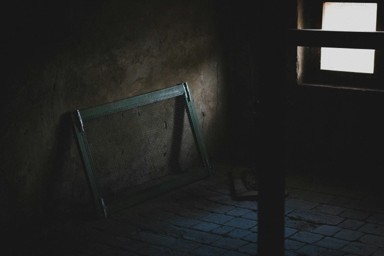 an abandoned room with a glass door and a radiator