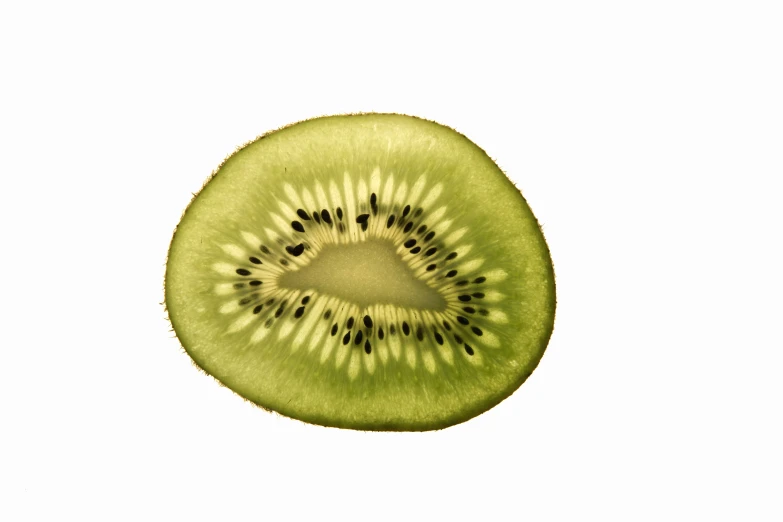 a kiwi fruit sliced up in half