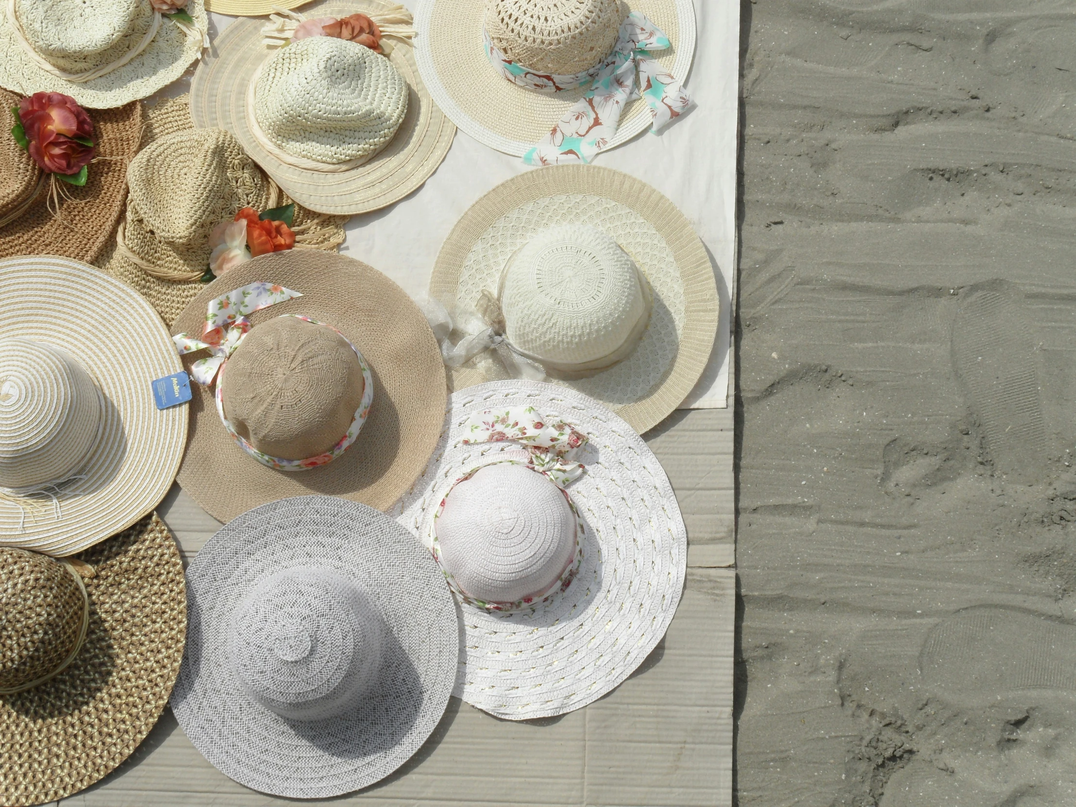 hats are laying on the floor next to each other