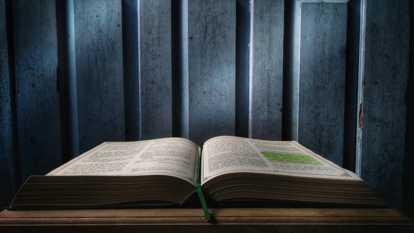 an open book sitting on top of a table