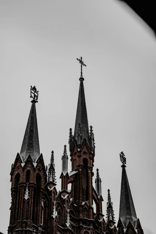 an old building with two towers and four spires