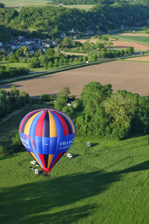 a  air balloon is flying in the sky