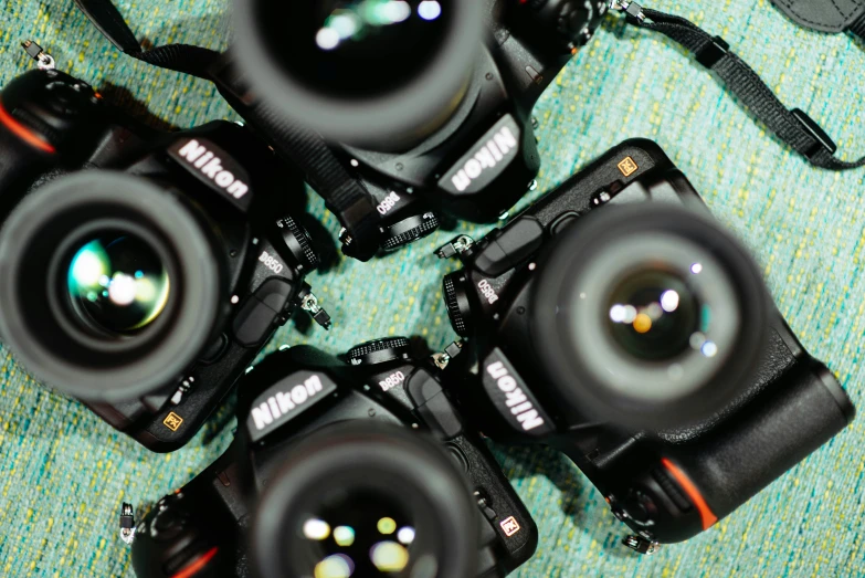 six cameras with different kinds of lens around them