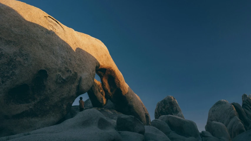 some large rocks and the sky in the background