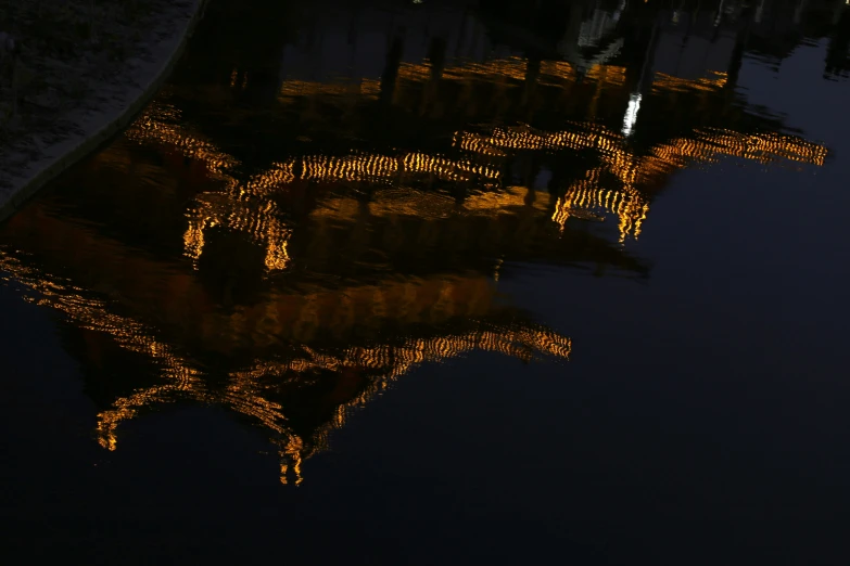 the reflection of buildings in the water near it's reflection