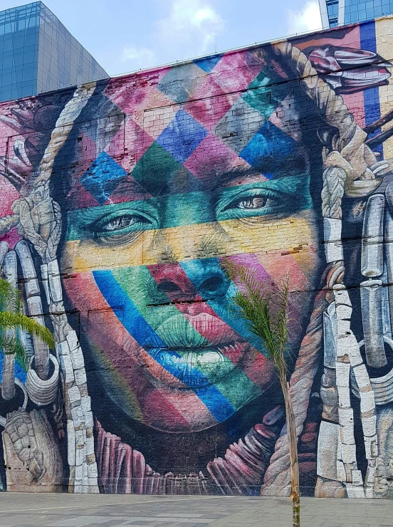 a colorful mural painted on the side of a building