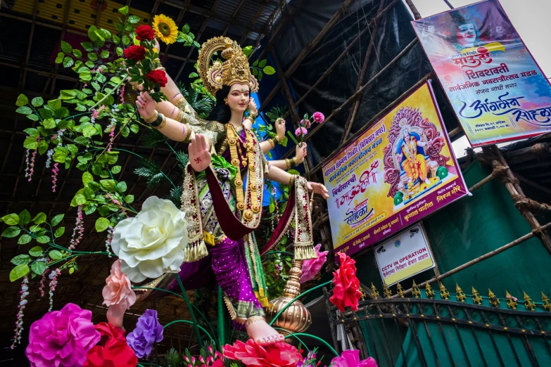 the statue of lord murud in front of an audience at an event