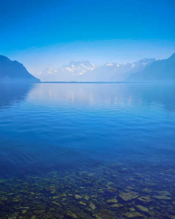 a boat floating on top of a large body of water