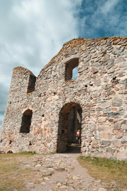 a man that is standing in a building