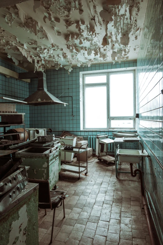 a run down restaurant that is full of chairs and counters