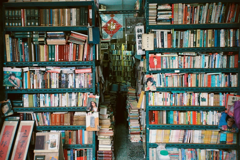 several books on bookshelves filled with brightly colored books