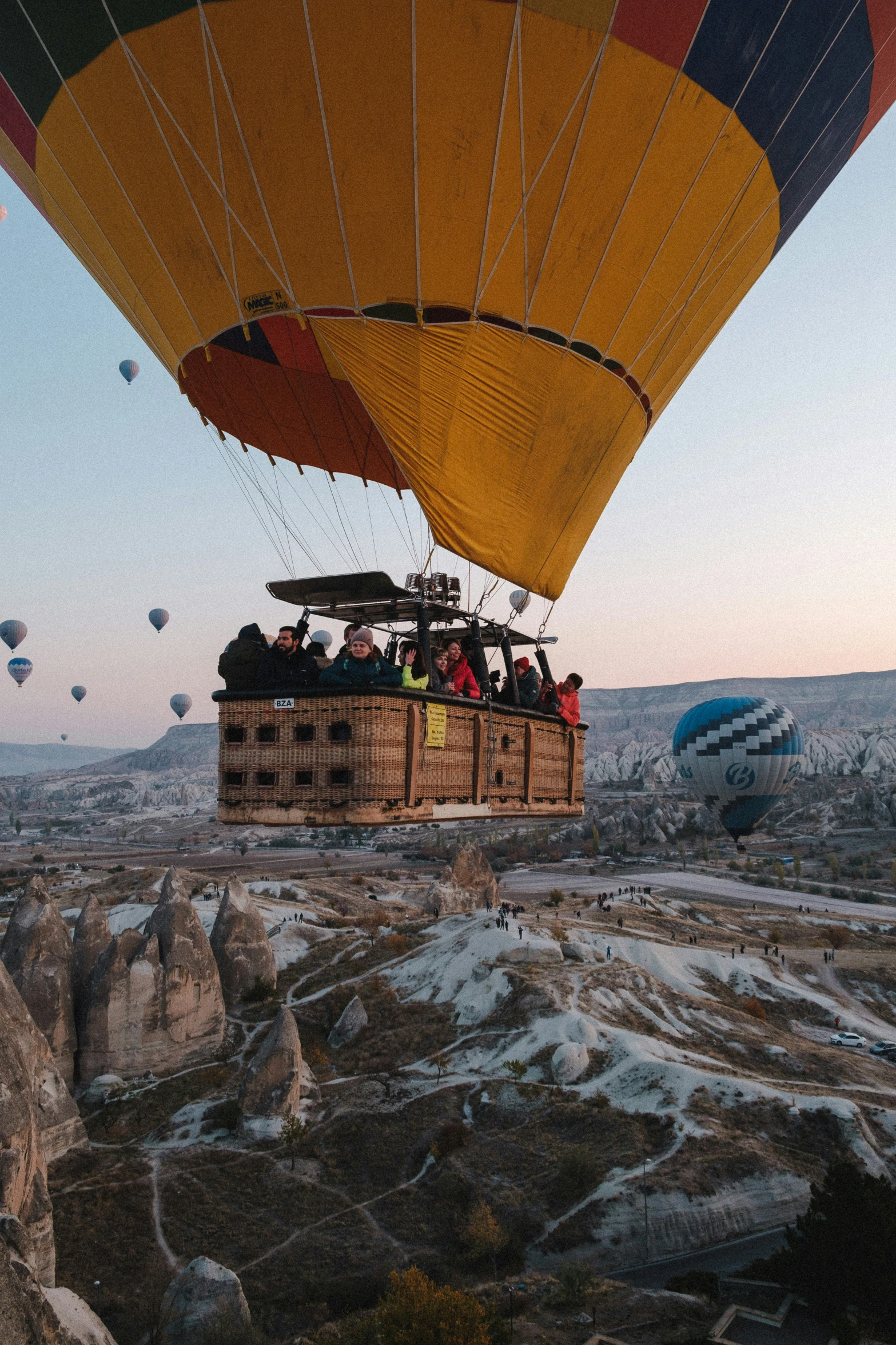 balloons flying in the sky while being lifted