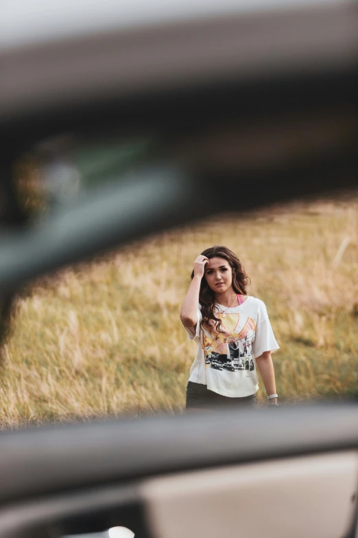 there is a woman that is standing in the street