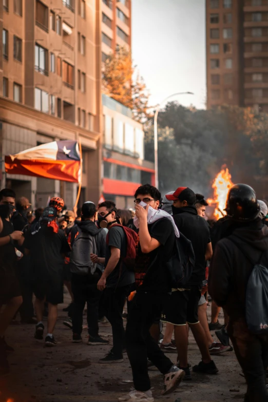 some protesters are outside with burning torches