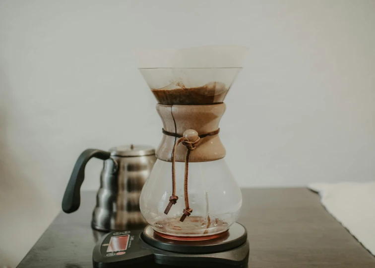 coffee being poured from a glass carafe