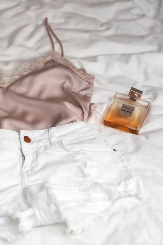 white shorts,   and perfume