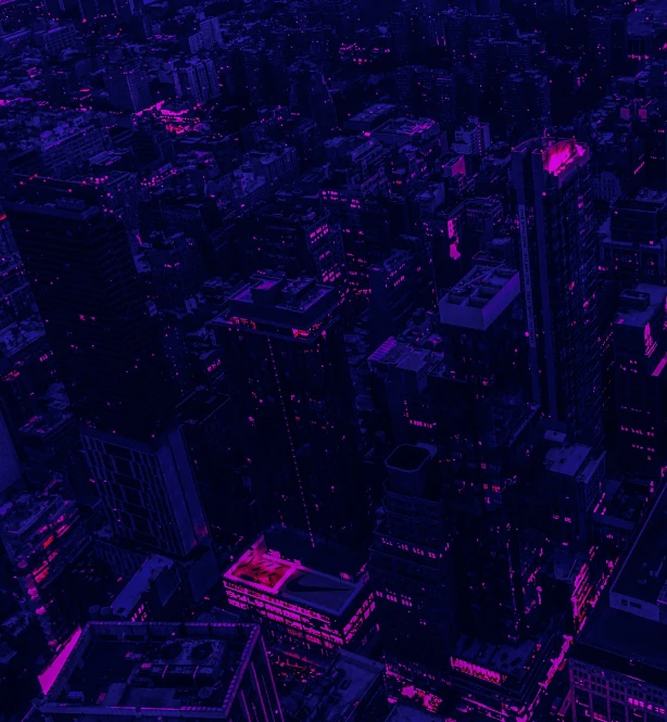 view of a city at night in neon light