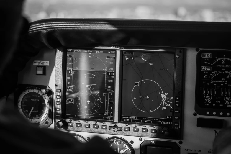 the cockpit area of a plane that shows the instruments