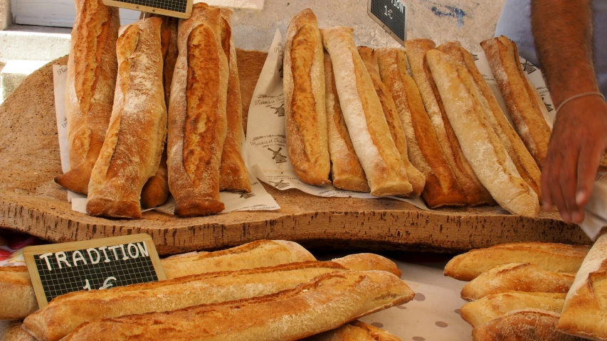 a table with bread sticks on it