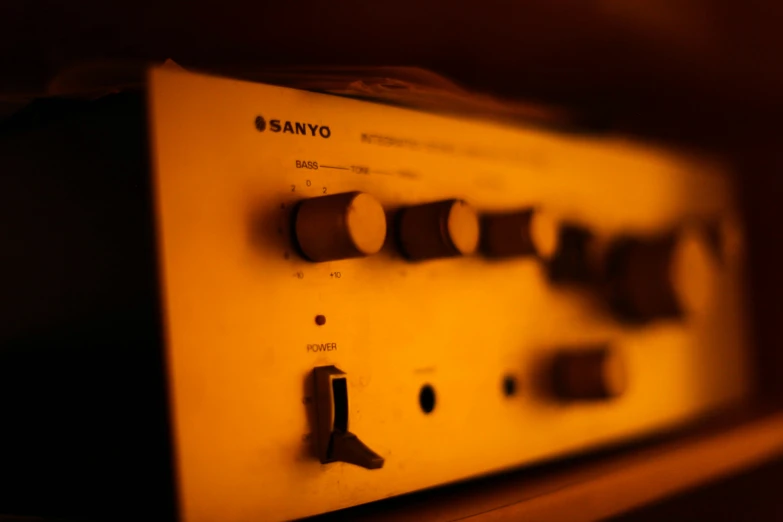 an old radio sitting on top of a desk