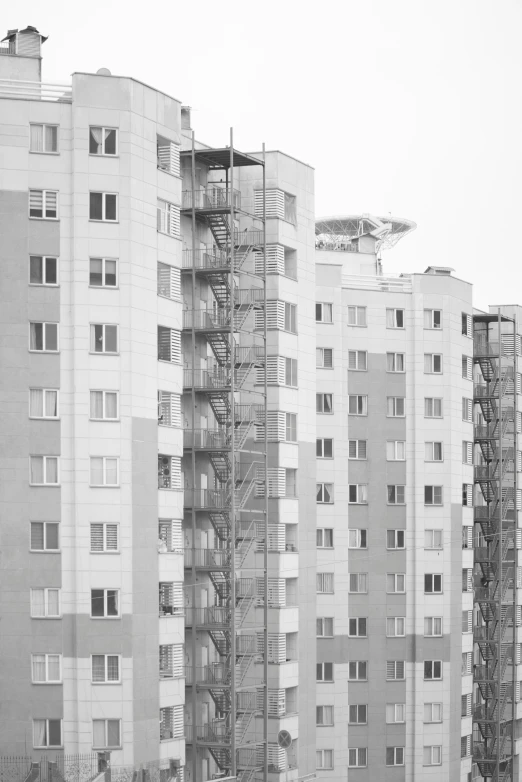 an old apartment building with scaffoldings on it