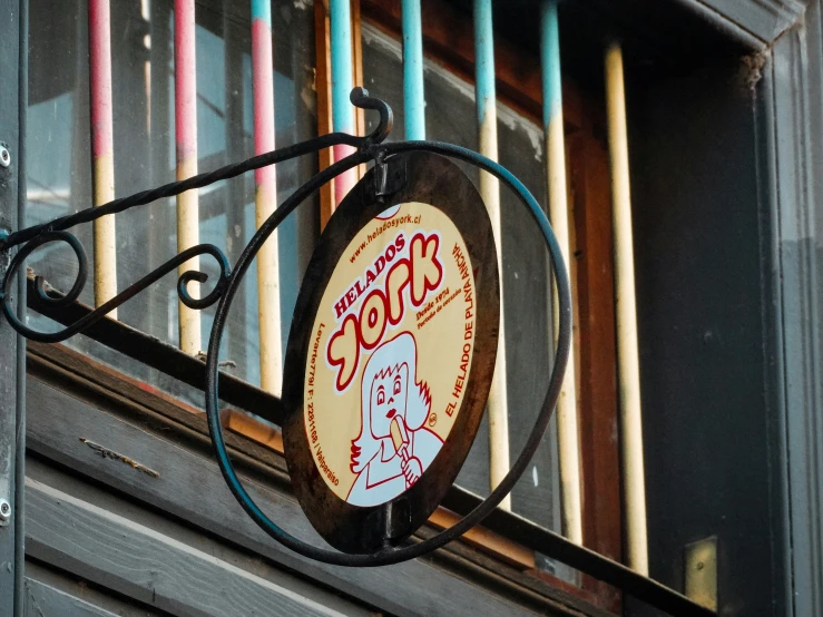 a close up view of a sign with the words cafe