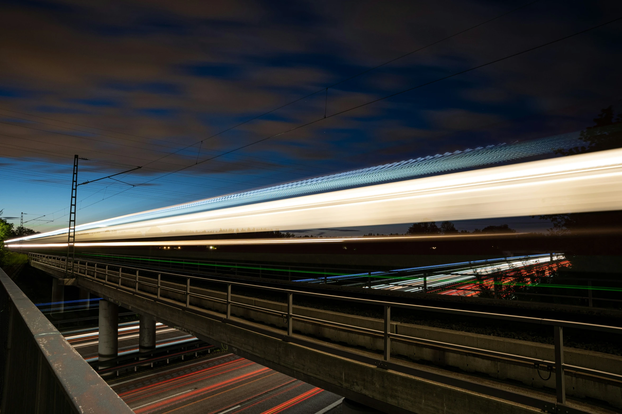 a blurry po of the train traveling on a track