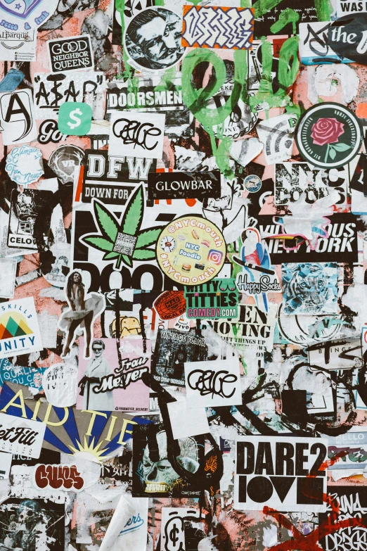 a wall covered in many different stickers