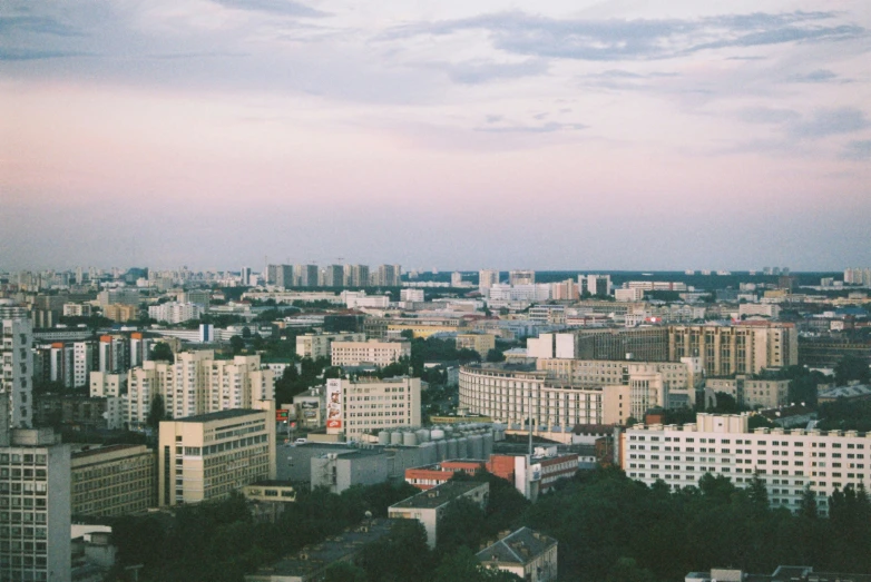 the city skyline is shown with large buildings in the distance