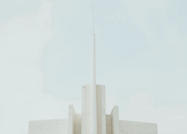 a tall building with a pointy spire on top