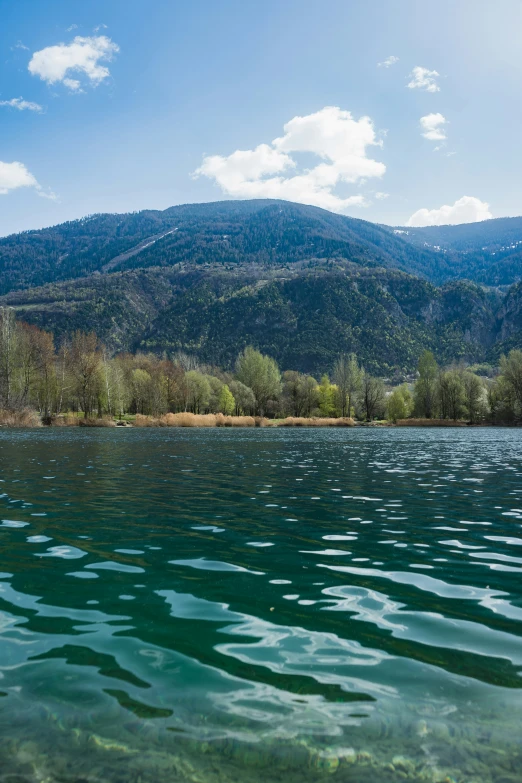 lake water with hills in the background