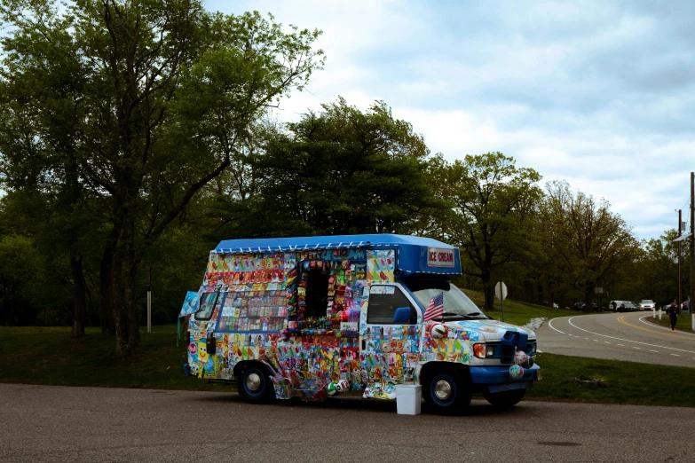 a street side cart with a van on the side