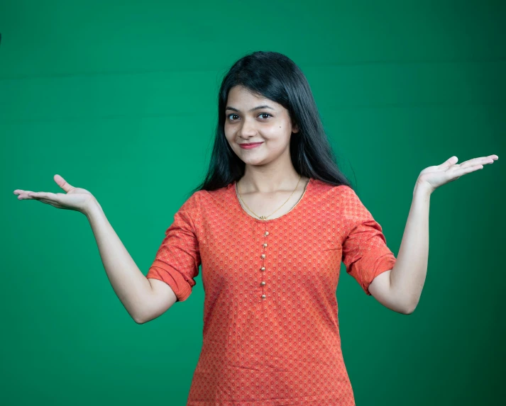 a woman showing off her hands to show you how strong she is