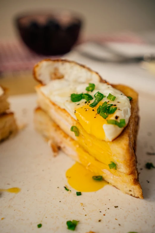 food is laying on a white plate with slices cut in half