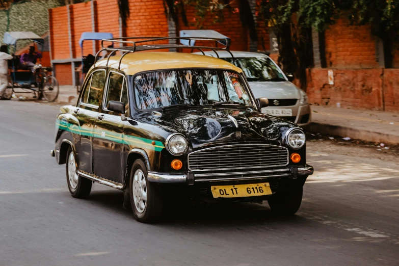 a mini car parked on the side of a road