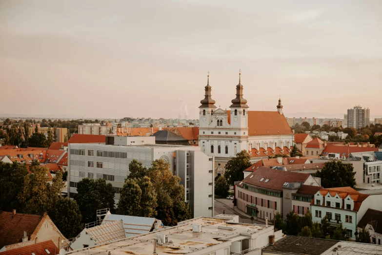 an aerial view of the city at sunset